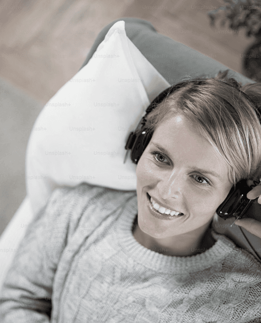 Patient relaxing with headphones during dental care