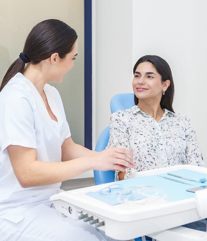 Dentist talking through a cosmetic treatment plan with a patient