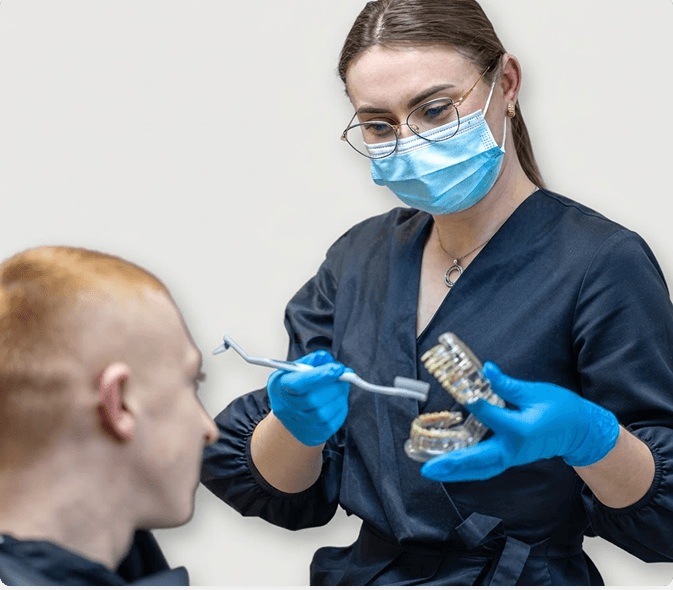 Dentist discussing exam results with a patient